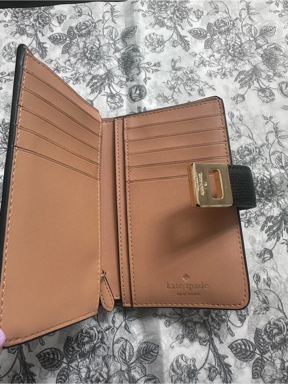 kate spade Black Pebbled Leather Continental Wallet with Gold Logo